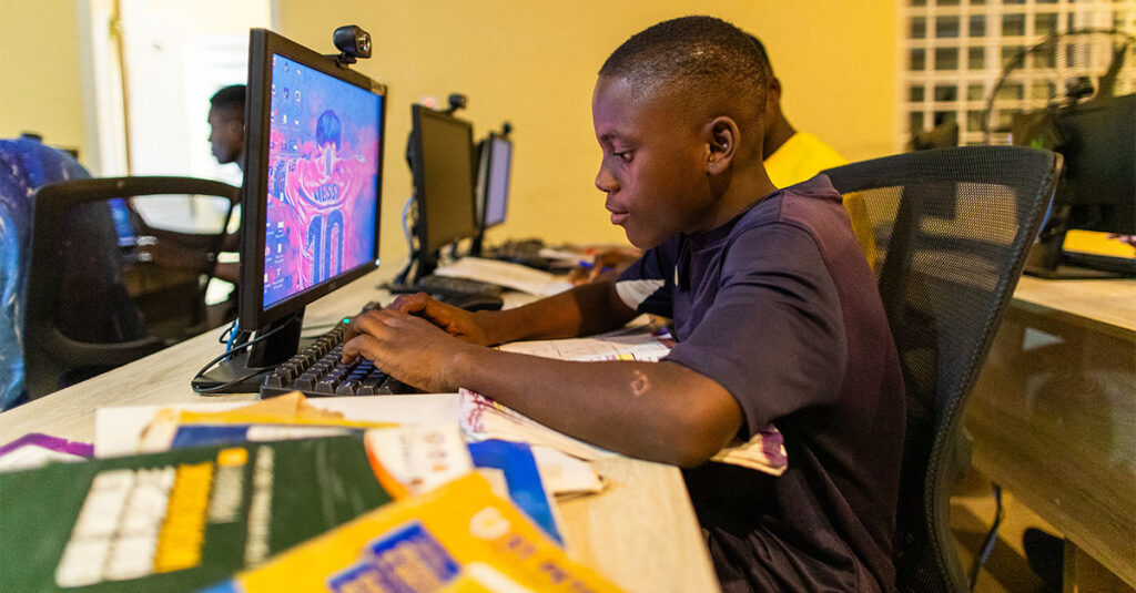 African boy on computer